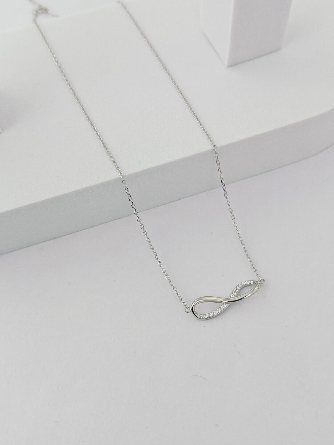 Silver Infinity Necklace with Cubic Zirconia Stones - Kivara jewels