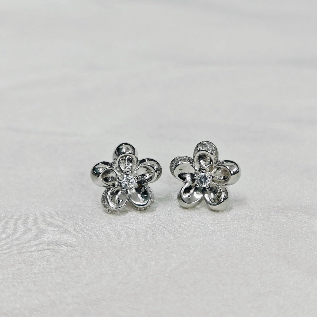 Silver - Tone Floral Stud Earrings - Kivara jewels